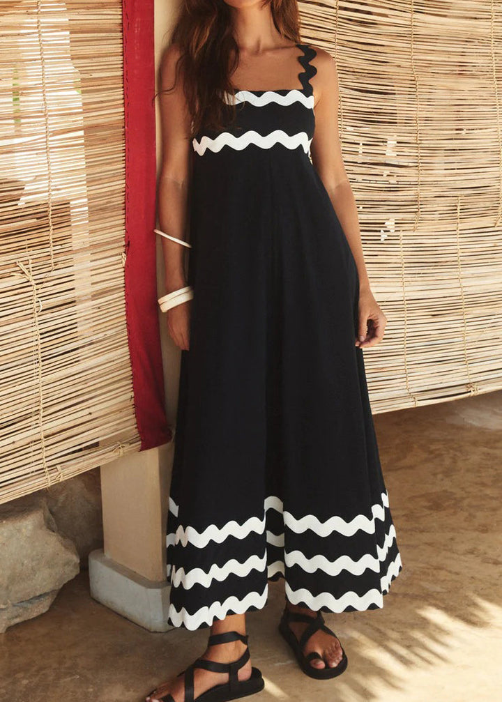 Robe longue noire à bretelles et surpiqûres en dentelle